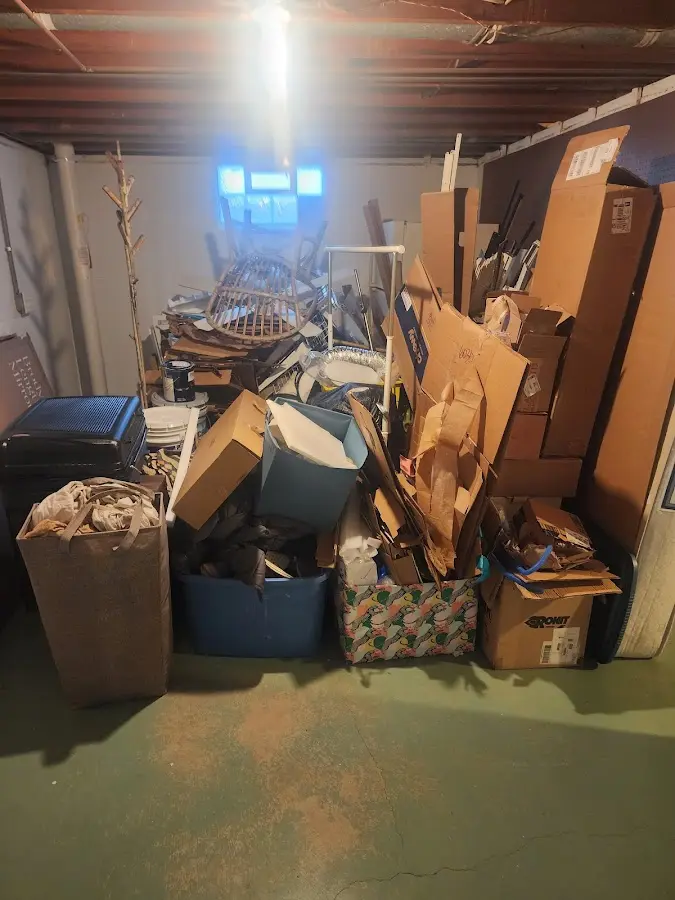 Roll-off dumpster container at job site for 15 Yard Dumpster Rental in St. Clair Shores